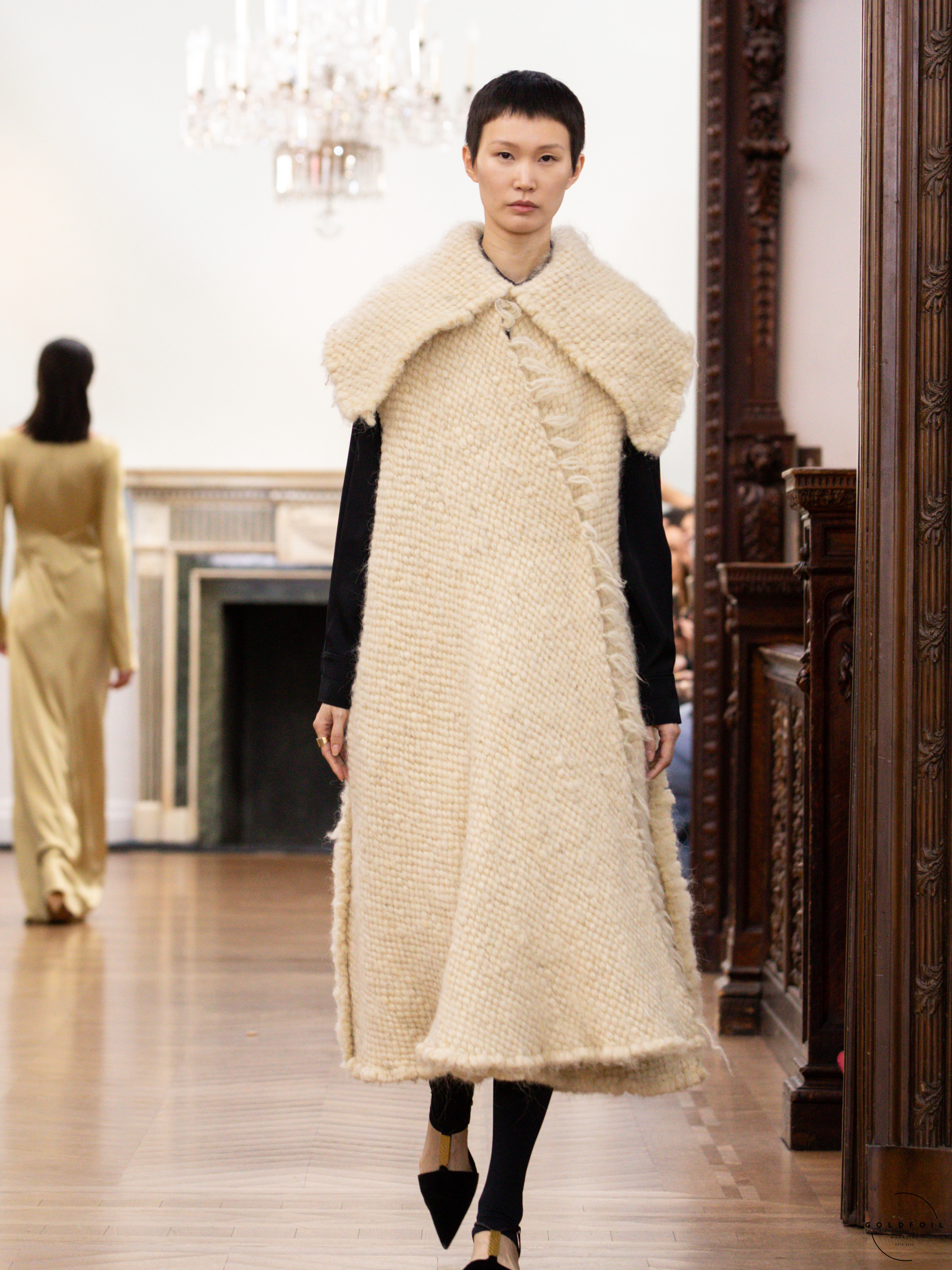 Bevza Coats: A-shaped Cuts Inspired by Traditional 'Kozukh' Description: Discover the homage to Ukrainian heritage in Bevza's Autumn/Winter 2024 coats, featuring A-shaped cuts inspired by the 19th-century 'Kozukh.' Meticulously crafted from sheepskin, these coats showcase a blend of tradition and modern fashion.